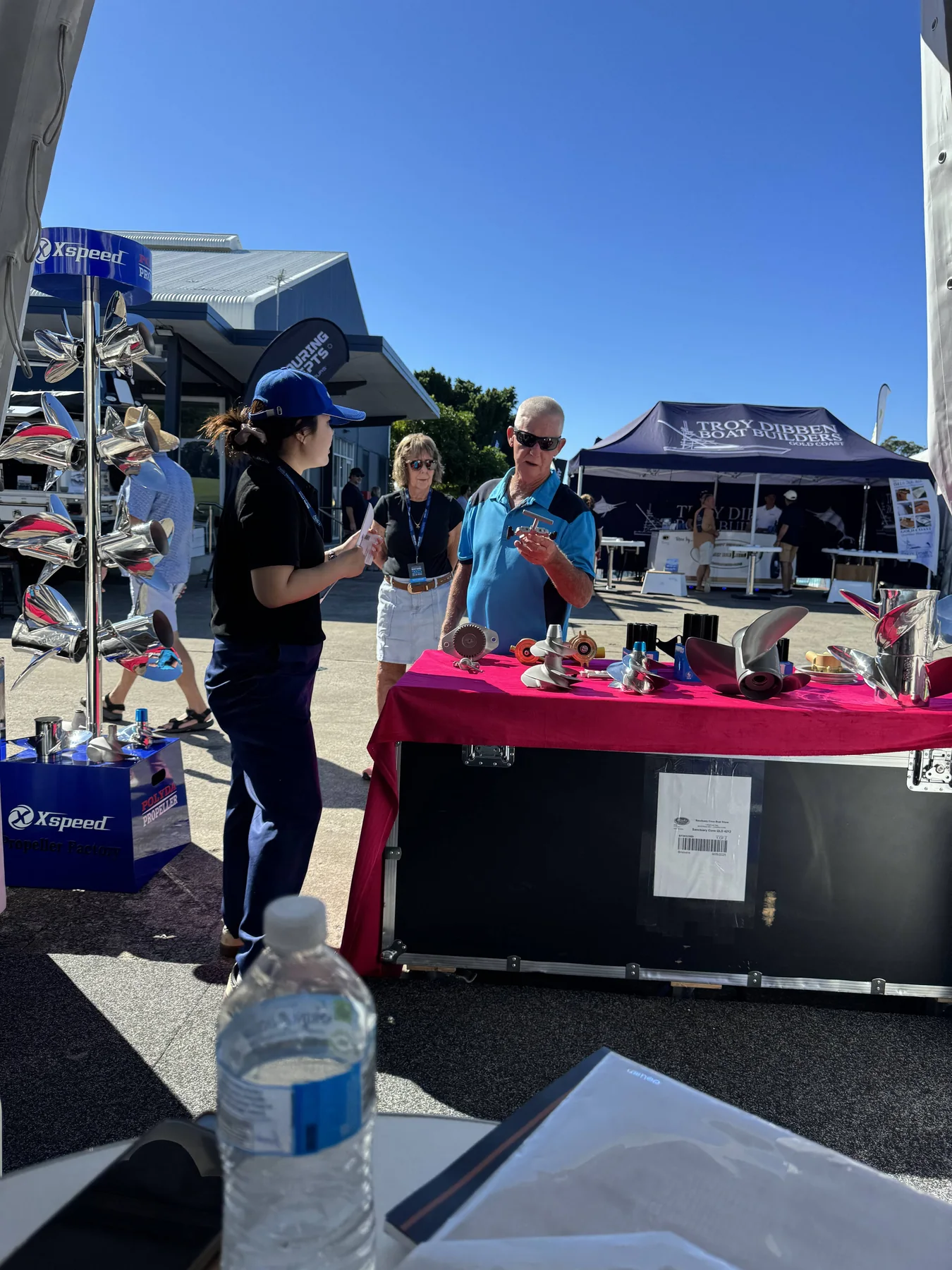 Customer conversation at the Xspeed booth during the 2025 Gold Coast boat show