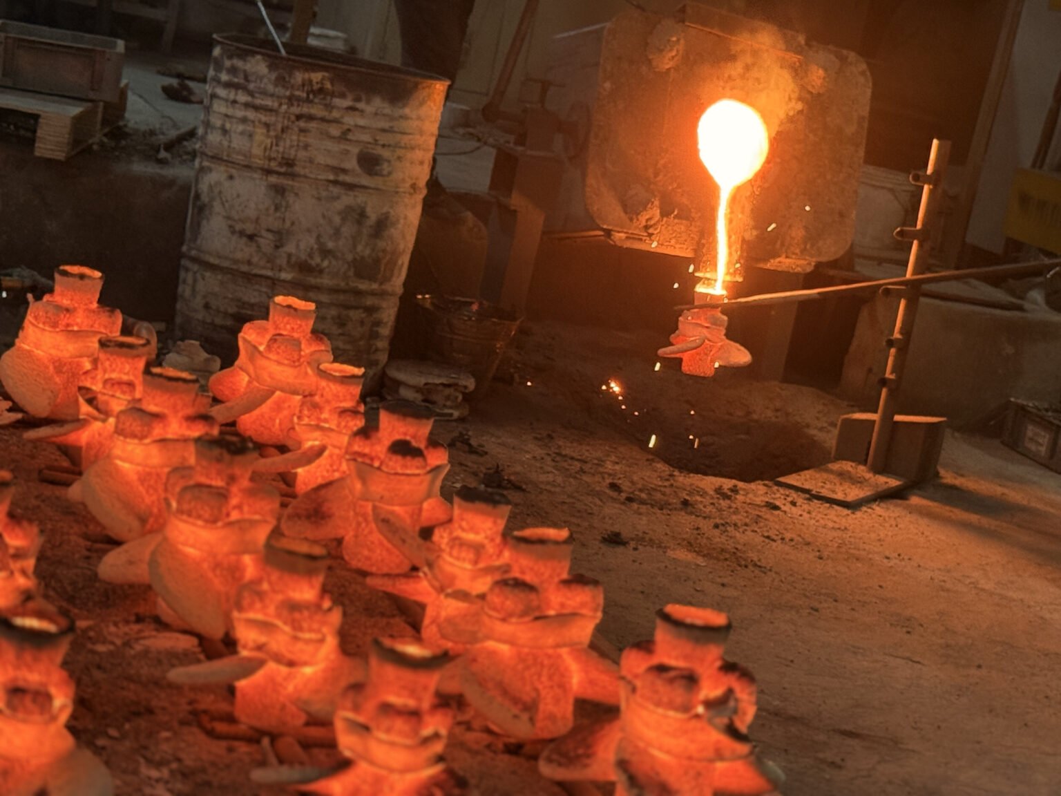 Molten stainless steel poured into prepared ceramic propeller shells