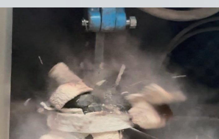 Mechanical removal of ceramic shell from a stainless steel casting